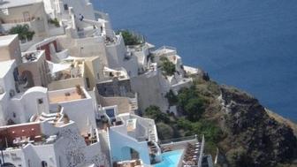 Santorini, a favorite popular attraction to cruise to, onboard select cruise lines.