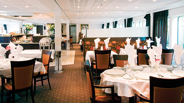 Enjoy a delicious gourmet dinner in the Cello Dining restaurant onboard an AmaWaterways river cruise.