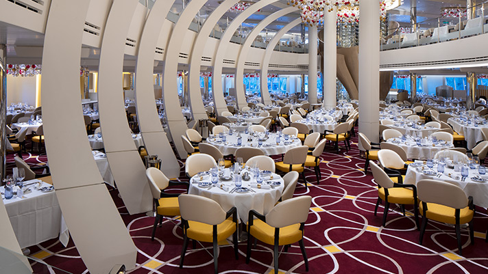 Indulge in gourmet cuisine at The Dining Room onboard a Holland America ship