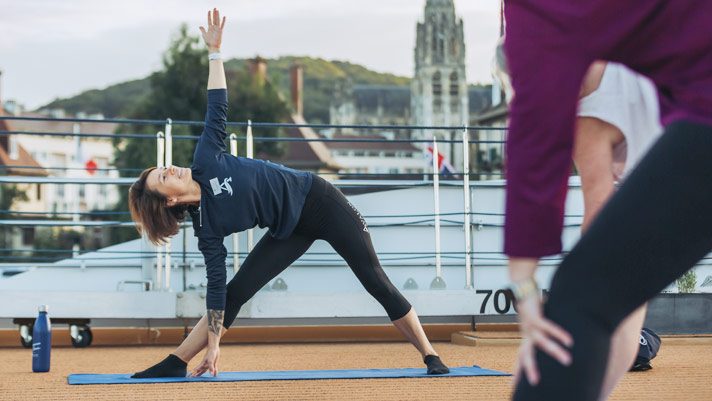 Take a yoga class on the Sky Deck