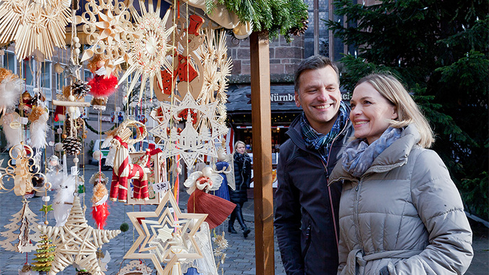 Shop for unique trinkets and gifts as you explore the Christmas Markets.