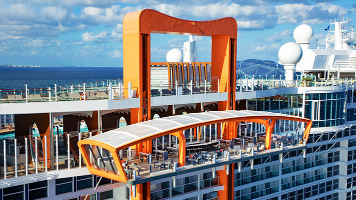 Enjoy a delicious cocktail on the innovative Magic Carpet venue onboard.