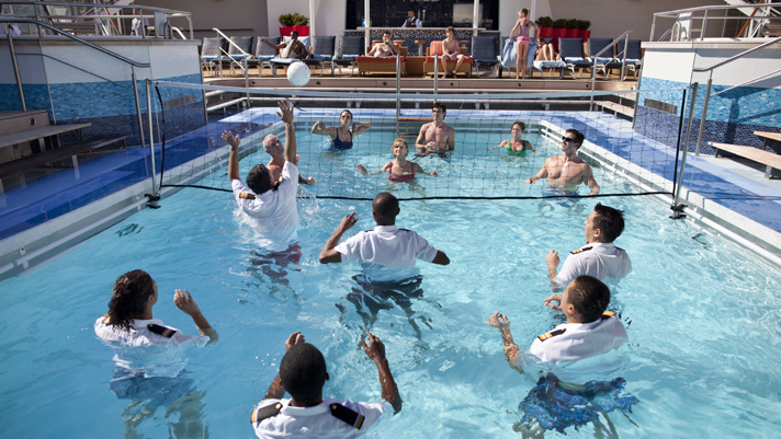 We enjoyed a front-row view of a crew vs. guest pool volleyball game.