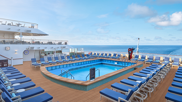 Soak up the sun next to the onboard pool oasis. 