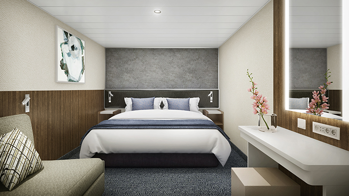 Unwind in a stylish and modern stateroom.