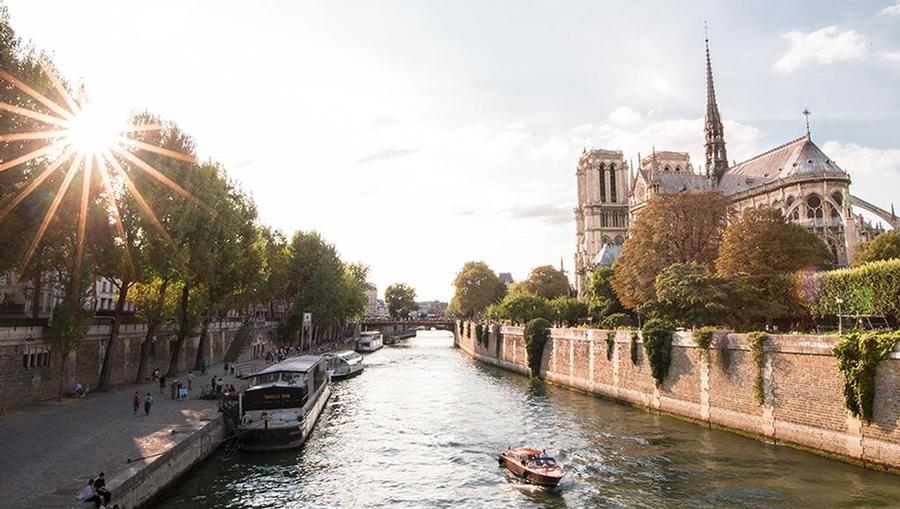 A view of a river and buildings in Paris.