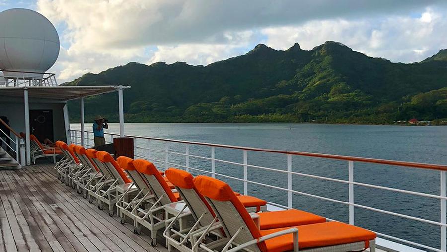 Lounge chairs on deck 8 of MS Paul Gauguin.