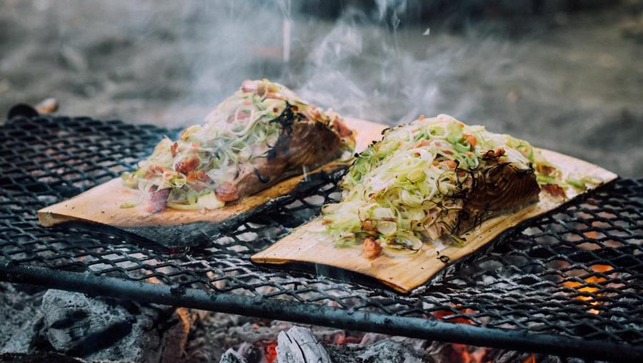 An Alaskan Salmon Bake over an open wood fire.