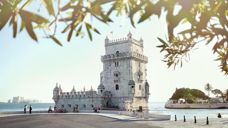 A Lisbon, Portugal building on by the water.