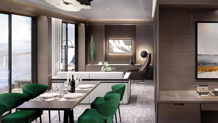 A dining room in a yacht cabin with an ocean view.