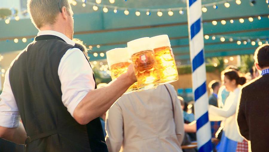 A round of beers being served at Oktoberfest in Munich.