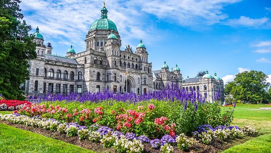 The British Columbia Parliament building in Vancouver seen from the front Lavender gardens.