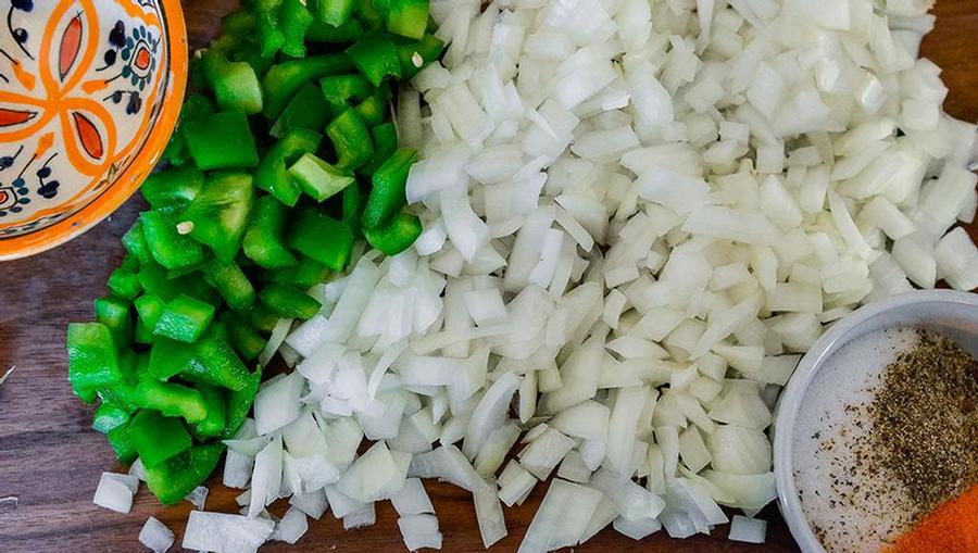Chopped onion and bell pepper for Sofrito