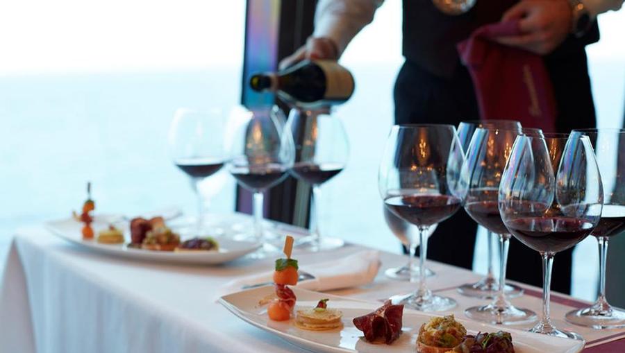Serving Wine at Toscana onboard Oceania Cruises.
