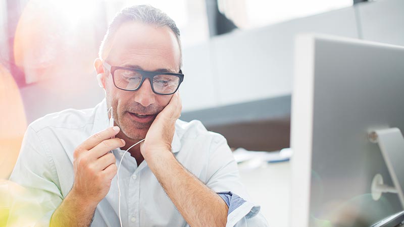 Vacation Planner working at computer